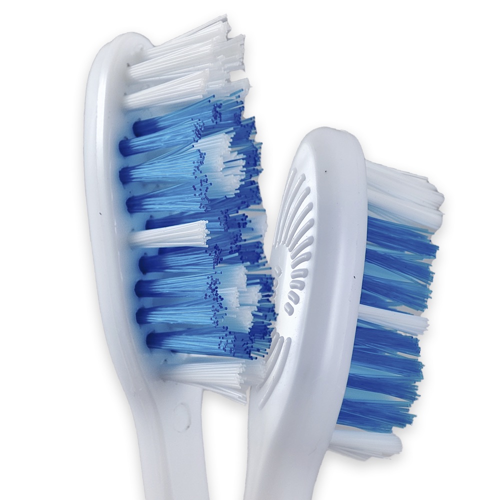 Cepillo dental adulto Happy Tooth Uka Int. Ecosum distribuidor autorizado Colombia. Cepillo ergonómico con goma antideslizante, limpiador de lengua y cerdas medias de nylon. Venta mayorista y minorista.